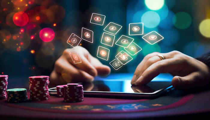 Is Zula Online Casino legit - Live Casino Magic - Live CasinoMagic Casino chips, smartphone, and floating cards, depicting an engaging mobile gaming experience at an online casino.