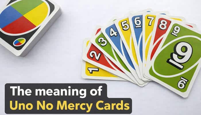 The meaning of Uno No Mercy Cards - Live Casino Magic - Live CasinoMagic How to Play Uno No Mercy: A fan of UNO No Mercy cards laid out, showing numbered cards from different colors, with the focus on 'The Meaning of UNO No Mercy Cards' text
