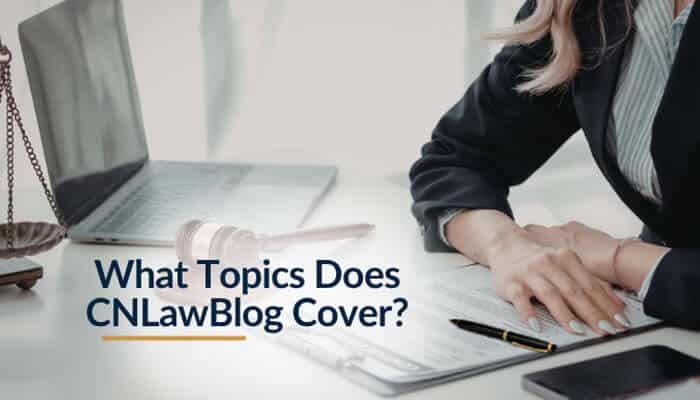 What Topics Does CNLawBlog Cover - Live Casino Magic - Live CasinoMagic Professional workspace showing a lawyer reviewing documents with laptop and scales, highlighting what topics CNLawBlog covers for 2026 legal guidance