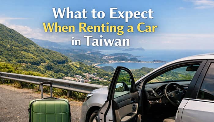 What to Expect When Renting a Car in Taiwan - Live Casino Magic - Live CasinoMagic Taiwan car rental Gharry offers a silver rental car parked on a scenic overlook with mountains and coastal views, ready for your adventure.