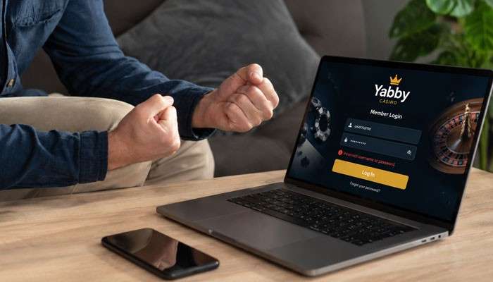 Common Yabby Casino Login Problems and Solutions - Live Casino Magic - Live CasinoMagic Yabby Casino Login troubleshooting guide showing a user accessing the casino member login page on a laptop, highlighting account sign-in issues, password recovery, and secure online account access solutions