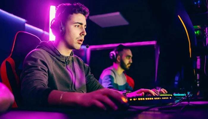Essential Skills for an Esports Player - Live Casino Magic - Live CasinoMagic Esports TheHake professional gaming scene showing competitive esports players using gaming equipment, headsets, and teamwork skills during an intense tournament practice session.