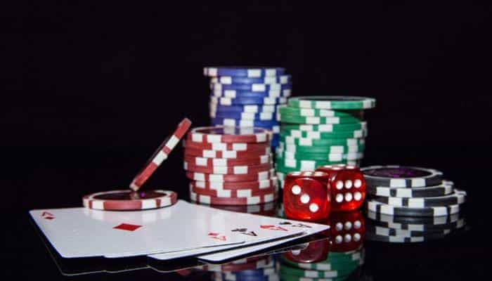 Is the LoneStar Casino Welcome Bonus Free - Live Casino Magic - Live CasinoMagic LoneStar Casino welcome bonus overview featuring poker chips, playing cards, and casino dice representing Gold Coins, Sweeps Coins, and promotional rewards for online social casino players