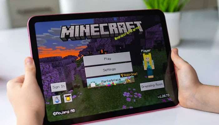 Sign In to Your Minecraft Account - Live Casino Magic - Live CasinoMagic Plugboxlinux Minecraft gaming guide showing a player holding a tablet with the Minecraft main menu, Play, Settings, and Sign In options.